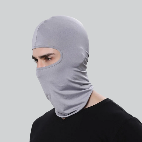 Gray balaclava for cold cycling, covering head and face with exposed eyes for warmth