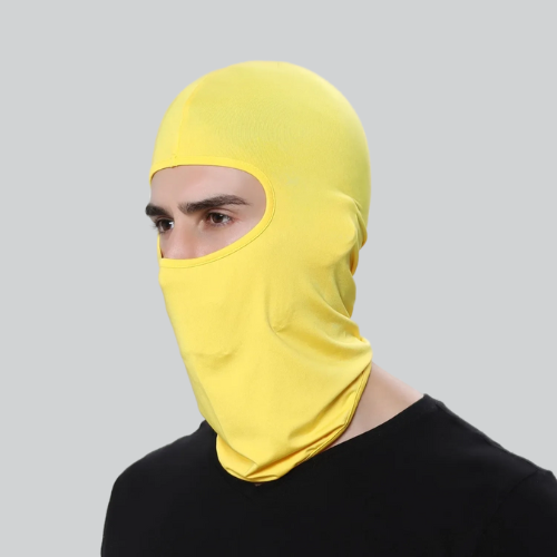 Bright yellow balaclava for cycling, covering head and face, leaving eyes exposed