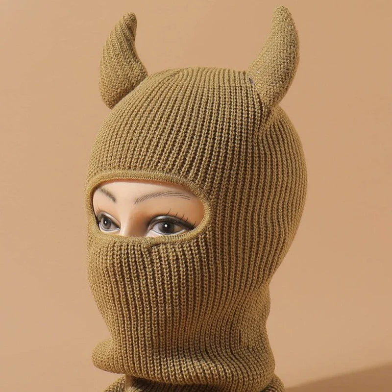 Knitted beige women’s fashion balaclava with horns and eye openings from Palmdale