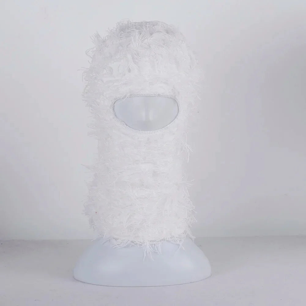 Fuzzy white distressed balaclava white with pale blue oval detail at the top