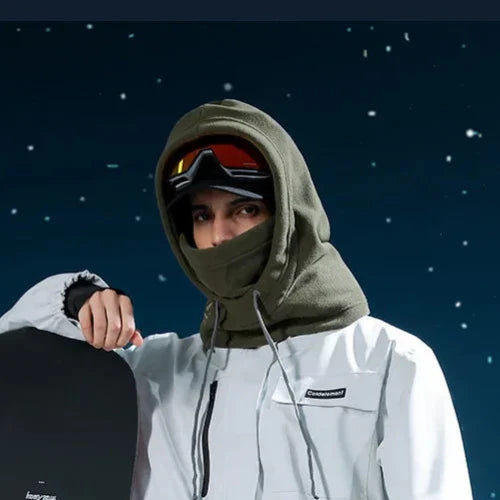 Person in fleece hooded balaclava and ski goggles for winter sports comfort