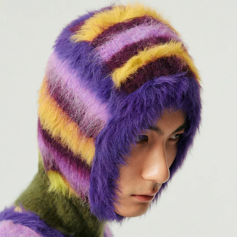 Colorful striped fuzzy winter hat with ear flaps from the Knitted Balaclava Design Cambridge