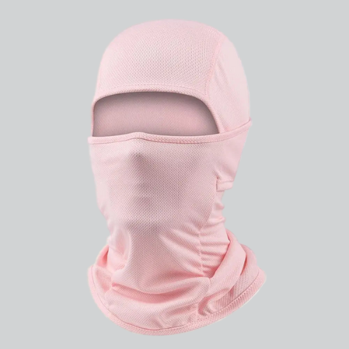 Pale pink balaclava ski mask covering head, ideal for stylish winter wear in Portland