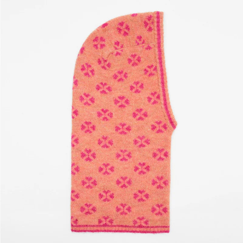 Peach-colored knitted balaclava with pink floral pattern for stylish warmth and comfort