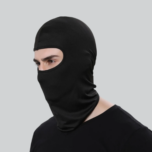 Black winter cycling balaclava covering head and face, exposing only the eyes