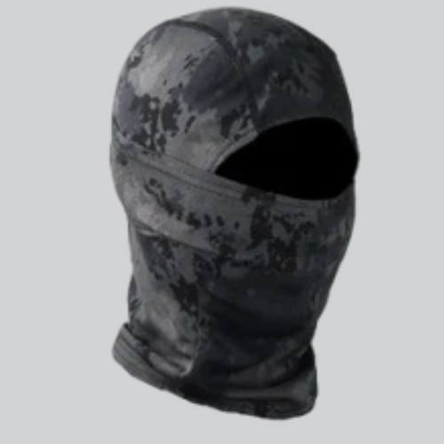 Camouflage-patterned women’s ski balaclava with single eye opening for outdoor adventures